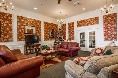 Cozy common area with comfortable seating and holiday decor