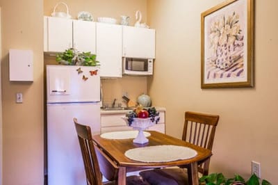 Cozy kitchenette area with a dining table
