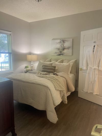 Cozy furnished bedroom in a senior living facility