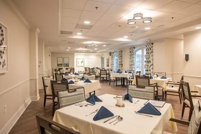 Dining room set for residents at Charter Senior Living