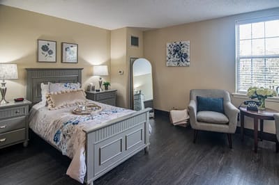 Cozy bedroom with floral decor and natural light