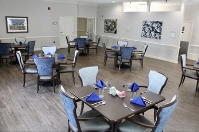 Dining room with tables set for meals