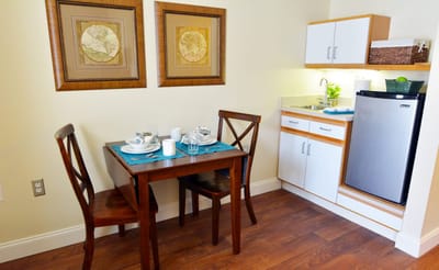 Cozy dining area in a senior living apartment