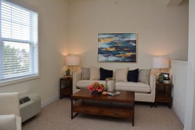 Cozy living area with a sofa and artwork