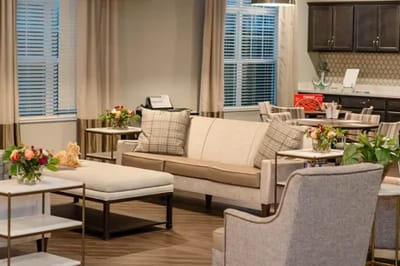 Bright common area with seating and plants