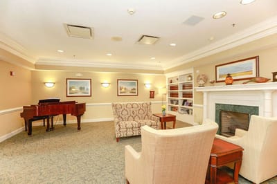Interior common area with chairs and a piano