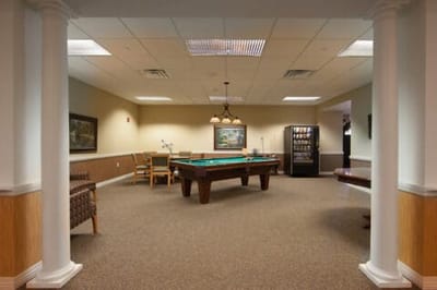 Common area with pool table and seating
