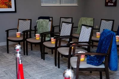 Chairs set up with popcorn for a movie event