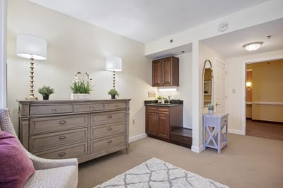 Cozy interior of a resident room with furniture