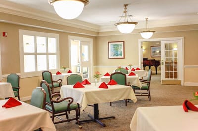 Dining room with tables set for meals