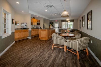 Interior common area with seating and kitchen space