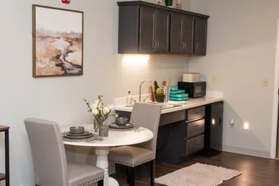 Interior of a furnished kitchen and dining area
