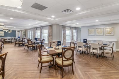 Bright dining room with tables and chairs