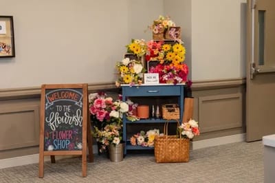 A vibrant flower arrangement display in the common area