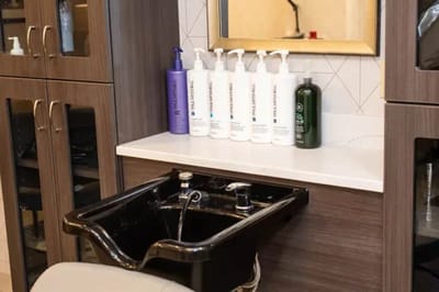 Hair salon station with products displayed
