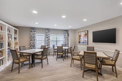 Interior of a common area with tables and chairs