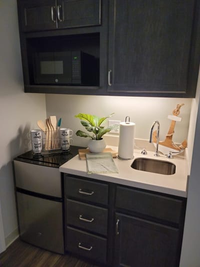 Cozy kitchenette setup with modern appliances