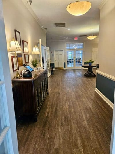 Interior hallway with light fixtures and seating