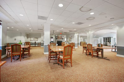 Bright common area with tables and chairs