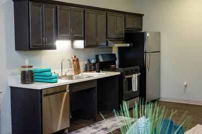 Well-equipped kitchenette in a stylish interior