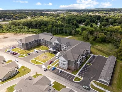 Aerial view of Charter Senior Living campus with green spaces