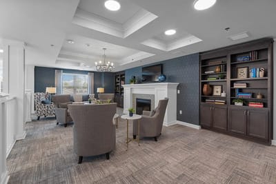 Interior common area with cozy seating and fireplace