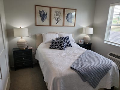 Cozy resident room with bed and decor