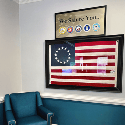 Decorative display honoring military service with flags