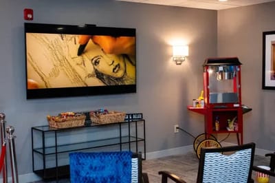 Activity room with art display and snack cart