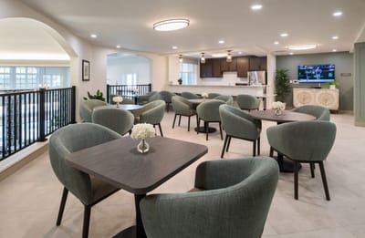 Bright common area with seating and decor