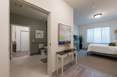 Interior view of a resident room with accessible bathroom