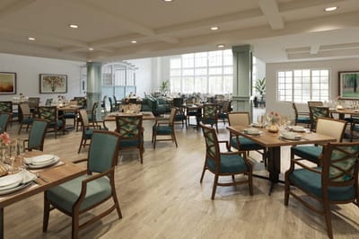 Bright dining room with tables and chairs