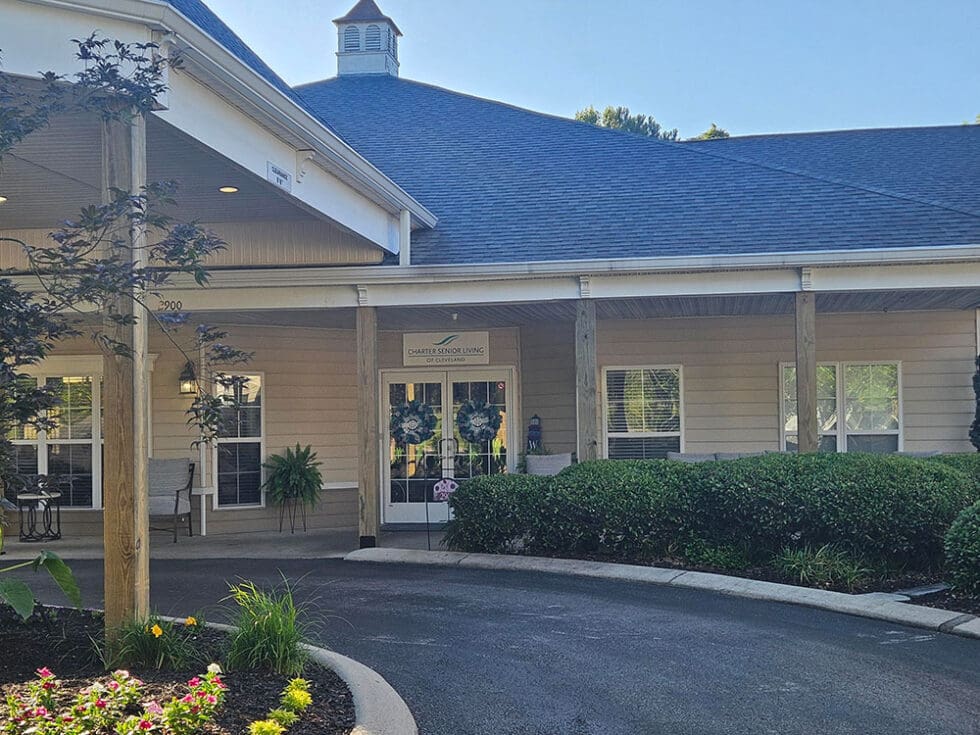 Entrance of Charter Senior Living of Cleveland with landscaped area