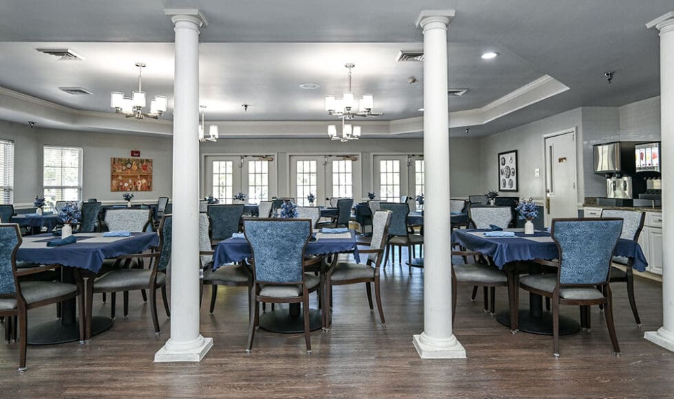 Dining room view with tables and chairs