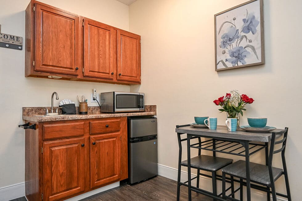 Cozy kitchenette in a senior living unit