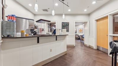 Interior view of a dining area with staff