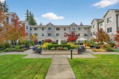 Outdoor courtyard with landscaped garden and seating