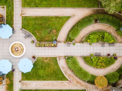 Aerial view of a landscaped courtyard with pathways and seating