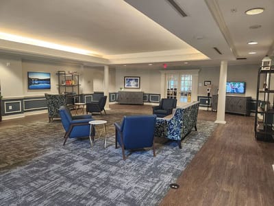 Common area with seating and artwork in the lobby