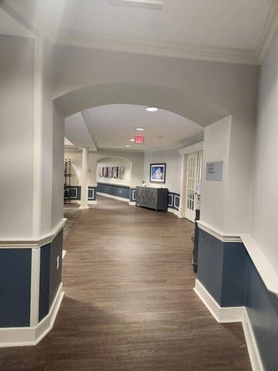 Interior hallway with artwork and furniture