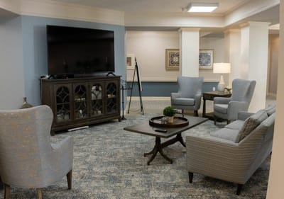 Cozy common area with seating and television