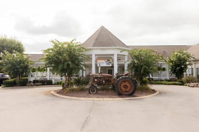 Exterior view of the facility entrance with landscaping