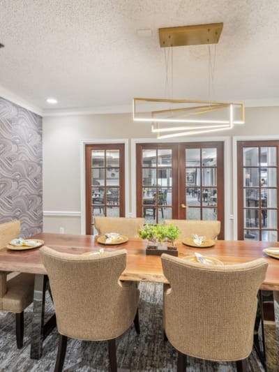 Elegant dining room with a large table and chairs