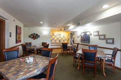 Dining area with tables and wall art