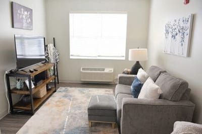 Cozy living room in a senior living facility apartment
