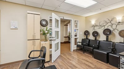 Interior view of a salon area with chairs