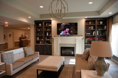 Cozy common area in a senior living facility with residents