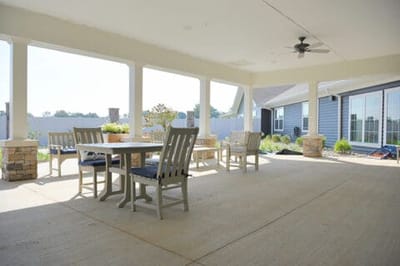 Outdoor seating area with a garden view