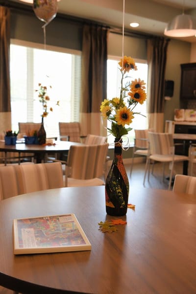 Interior dining area with a floral centerpiece