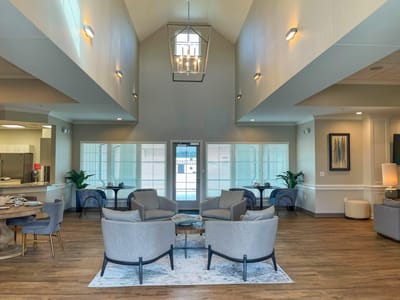 Bright common area with seating and natural light